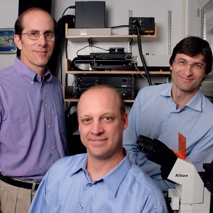 Kenneth S. Zaret, PhD pictured with two associates.